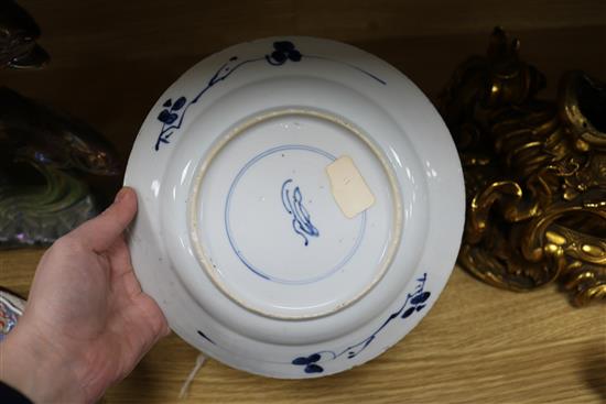 A pair of early 18th century Chinese blue and white plates Diameter 21cm